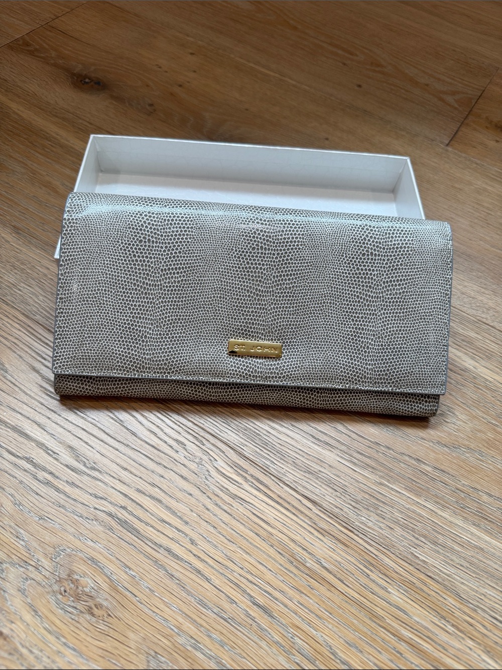 St. John Textured Gray Clutch with Gold Plaque